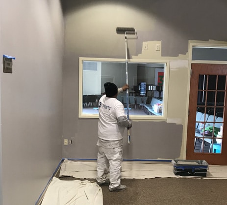 Sean Hadden Painting employee providing commercial interior painting services.