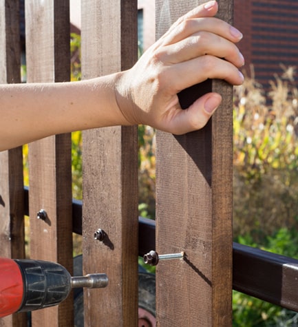 Sean Hadden Painting providing wooden fence repair services in Carmel, IN.